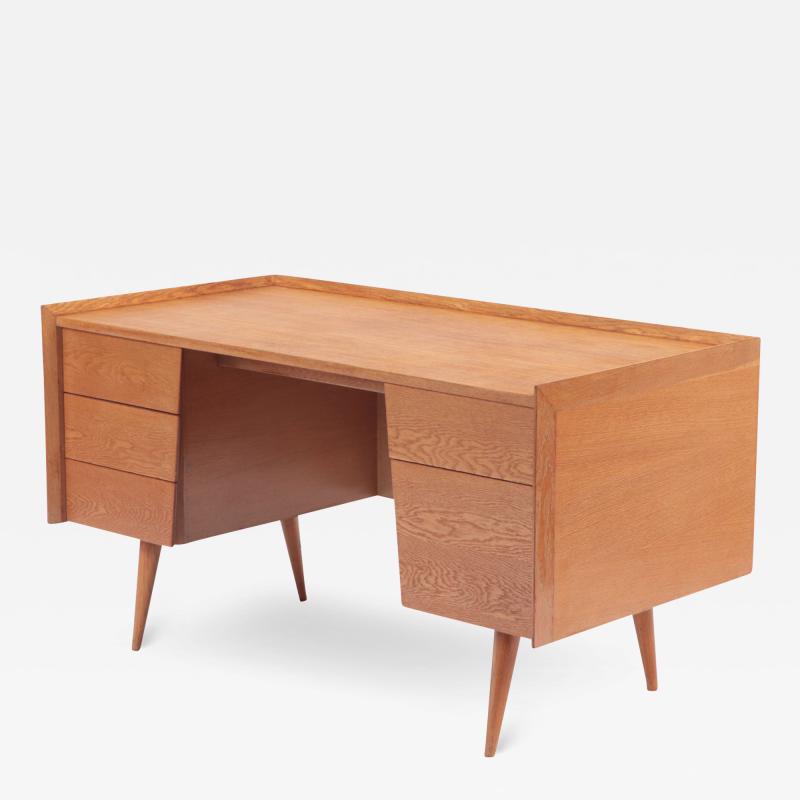 A rare white oak mid century modern desk labeled Risom Design circa 1950 