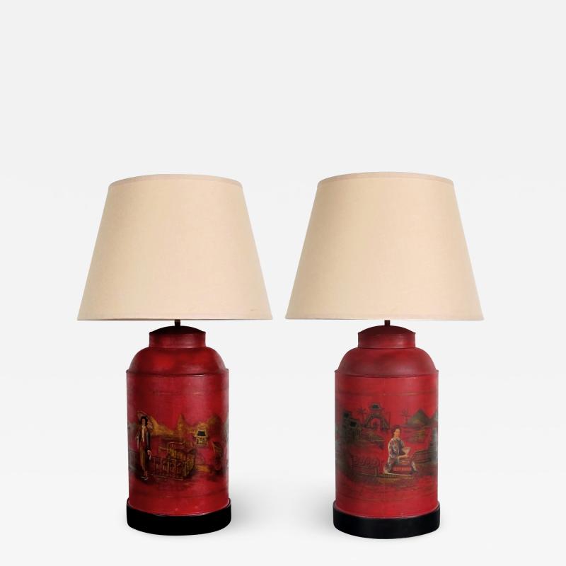 A robust pair of English chinoiserie style red painted tole lamps