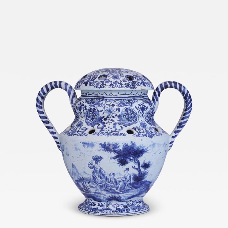 A round blue and white Delftware tulipiere from the 19th century