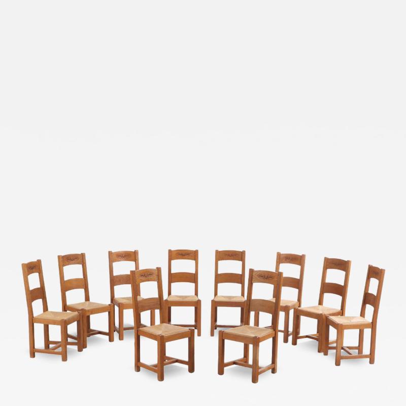 A set of 14 French oak ladderback dining chairs C 1960 