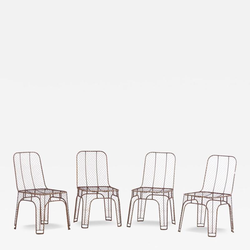 A set of 4 French iron side chairs C 1980 