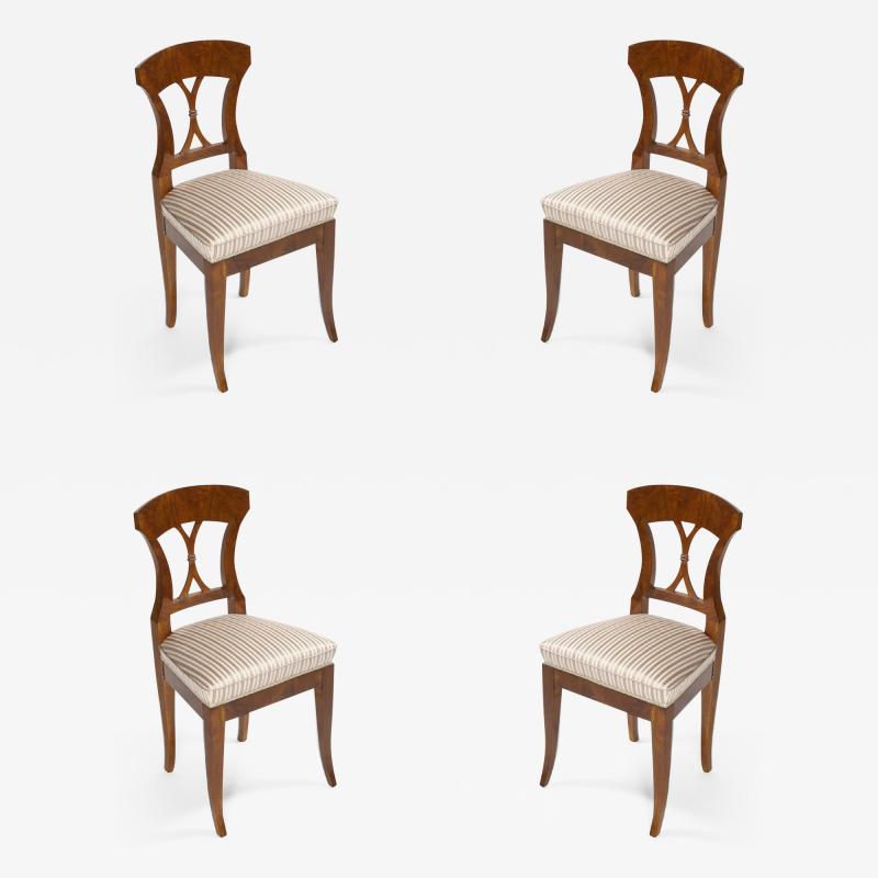 A set of four Biedermeier side chairs
