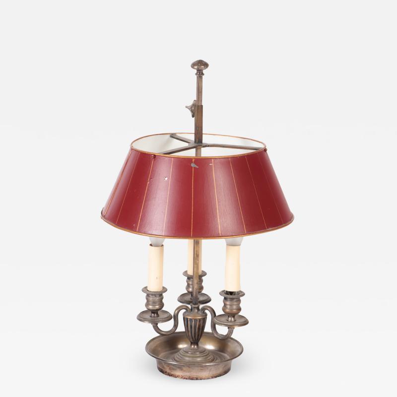 A silver plated bouillotte lamp with tole shade nineteenth century