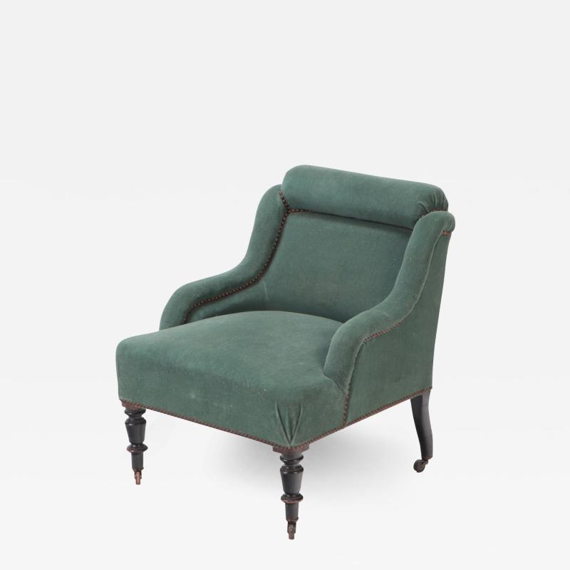 A small French Napoleon III green upholstered armchair late 19th C 