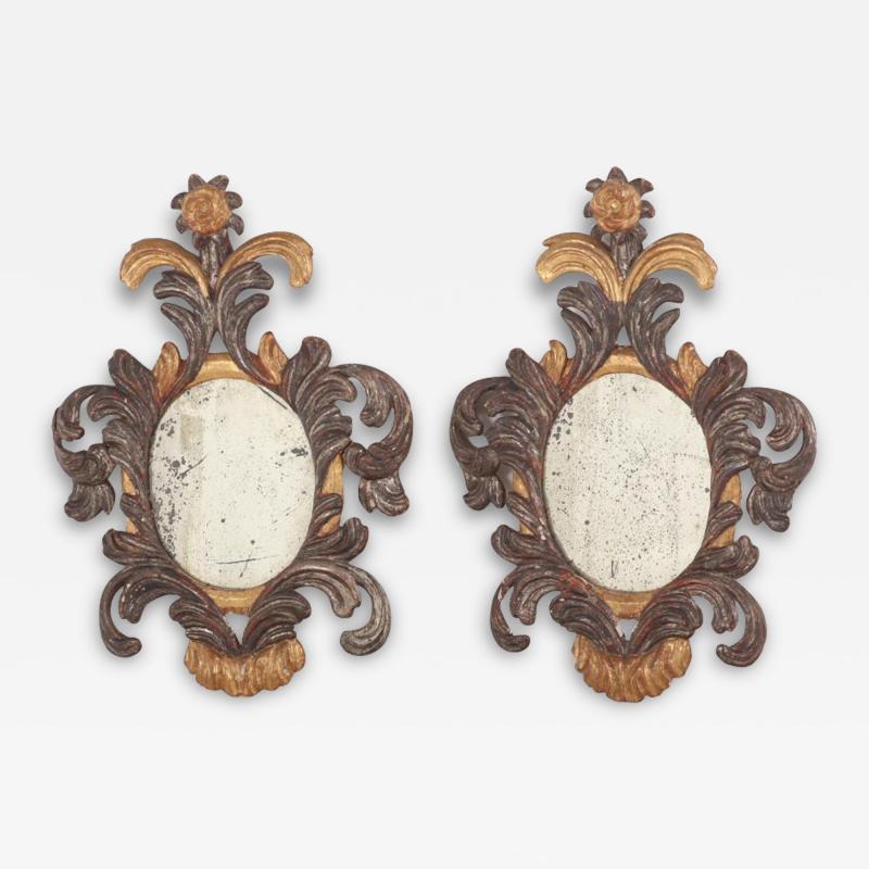 A small pair of Italian silver giltwood mirrors C 1900 