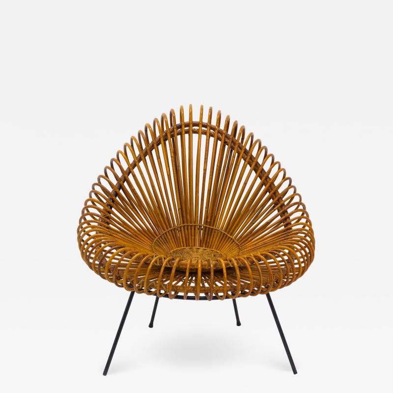 A stylish rattan and iron chair designed by Janine Abraham 