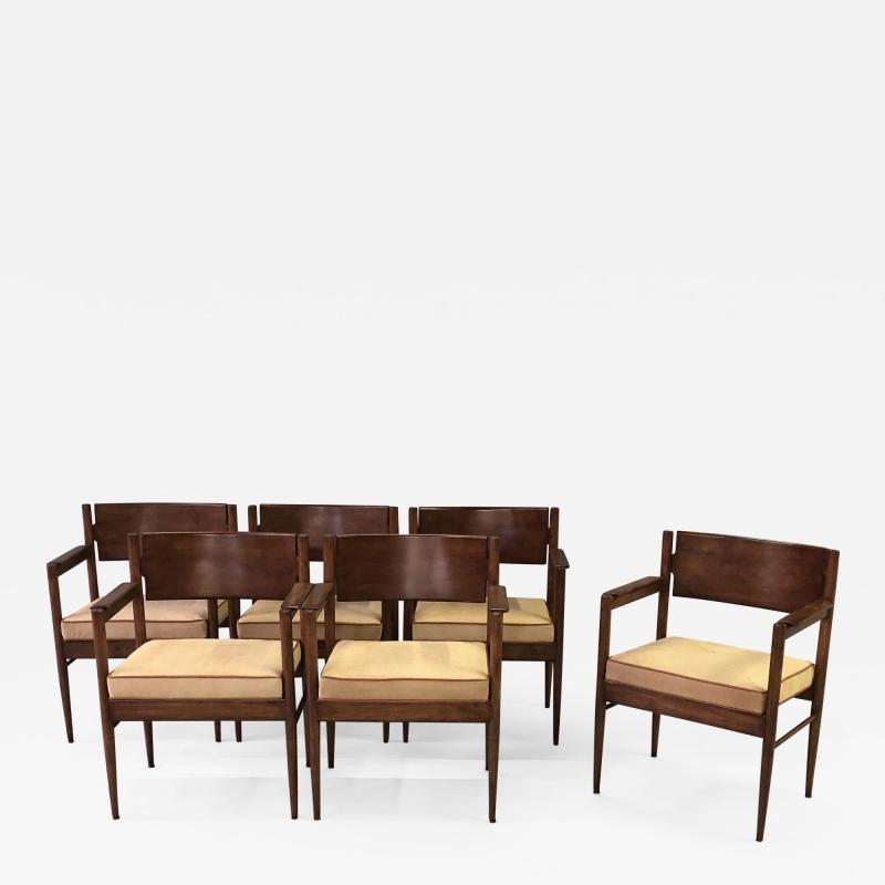 A stylish set of 6 Italian cherry wood arm chairs with tan boar skin upholstery