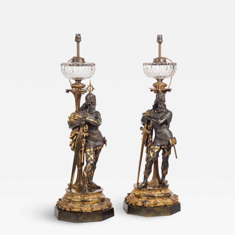 A very fine pair of mid Victorian parcel gilt bronze oil lamps by Hinks