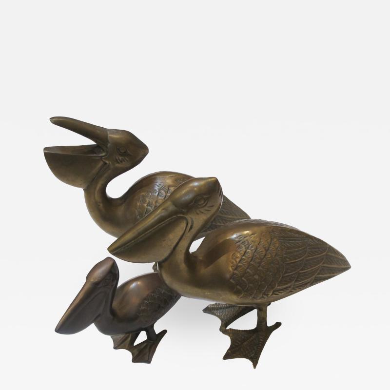 A whimsical set of 3 American 1960s brass pelicans