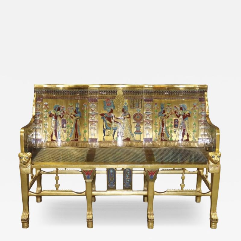 AMAZING EGYPTIAN REVIVAL GOLD ENAMELED BRASS AND GILDED WOOD LION ARM BENCH