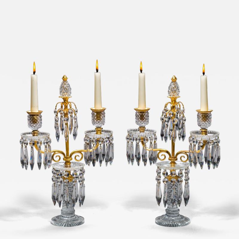 AN ELEGANT PAIR OF ORMOLU GLASS REGENCY CANDELABRA
