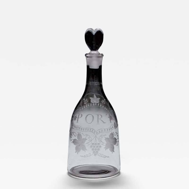 AN ELEGANTLY ENGRAVED PORT DECANTER