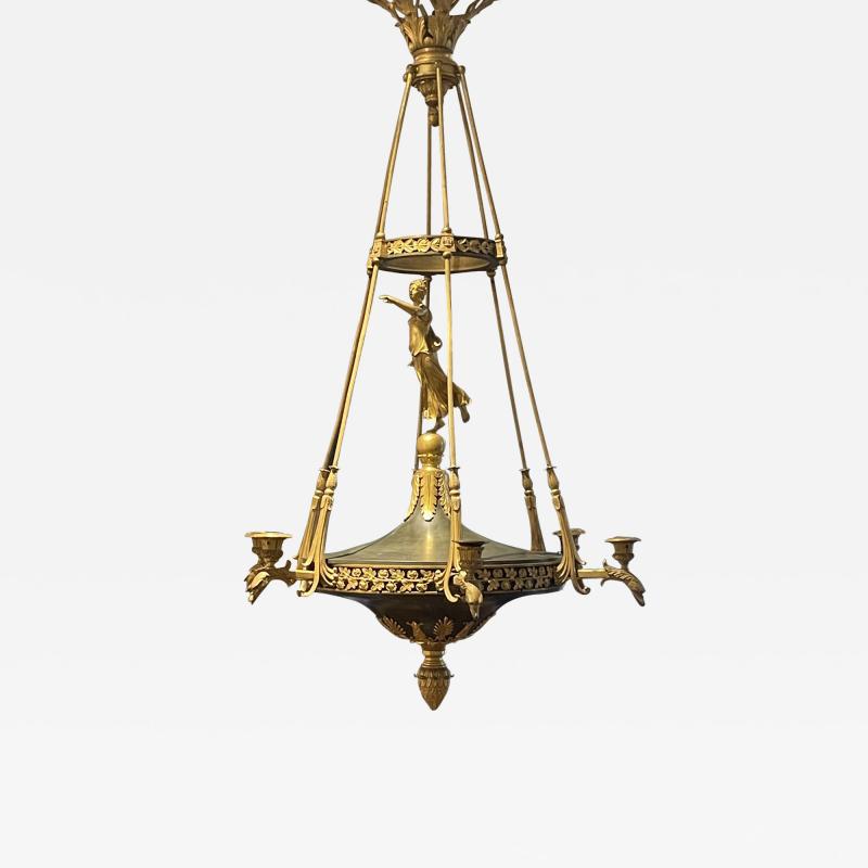 AN EMPIRE STYLE ORMOLU SIX LIGHT CHANDELIER