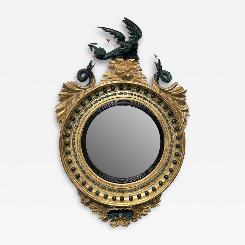 AN ENGLISH REGENCY CONVEX MIRROR