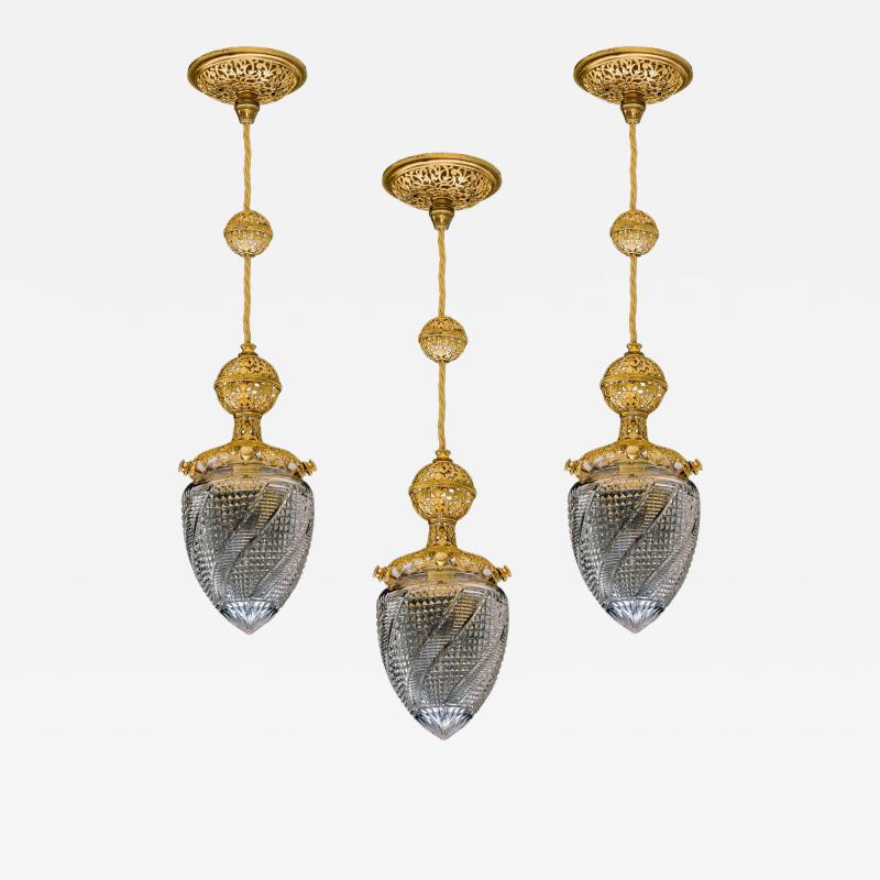 AN EXQUISITE SET OF THREE EDWARDIAN PENDENT LIGHTS