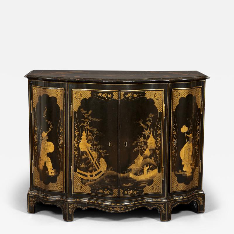 AN IMPOSING SERPENTINE FRONTED CHINOISERIE BLACK LACQUER SIDE CABINET