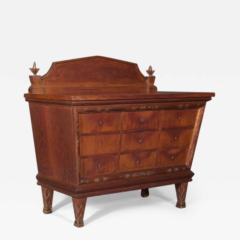AN INTERESTING ARTS AND CRAFTS OAK COMMODE