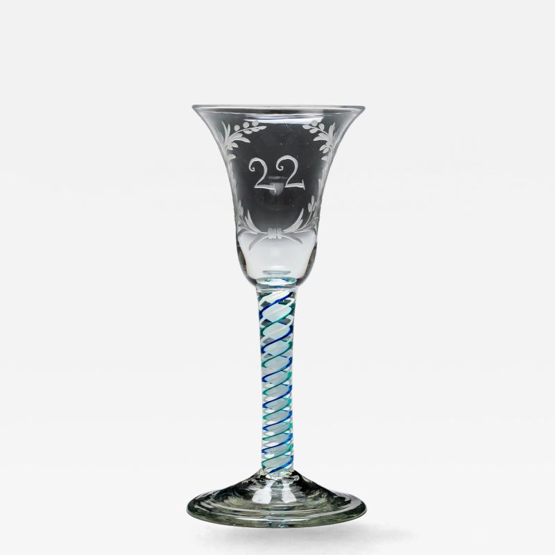 AN UNUSUAL ENGRAVED BLUE GREEN COLOUR TWIST