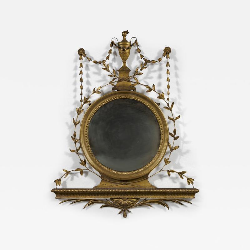 AN UNUSUAL GEORGE III GILTWOOD AND COMPOSITION CONVEX MIRROR