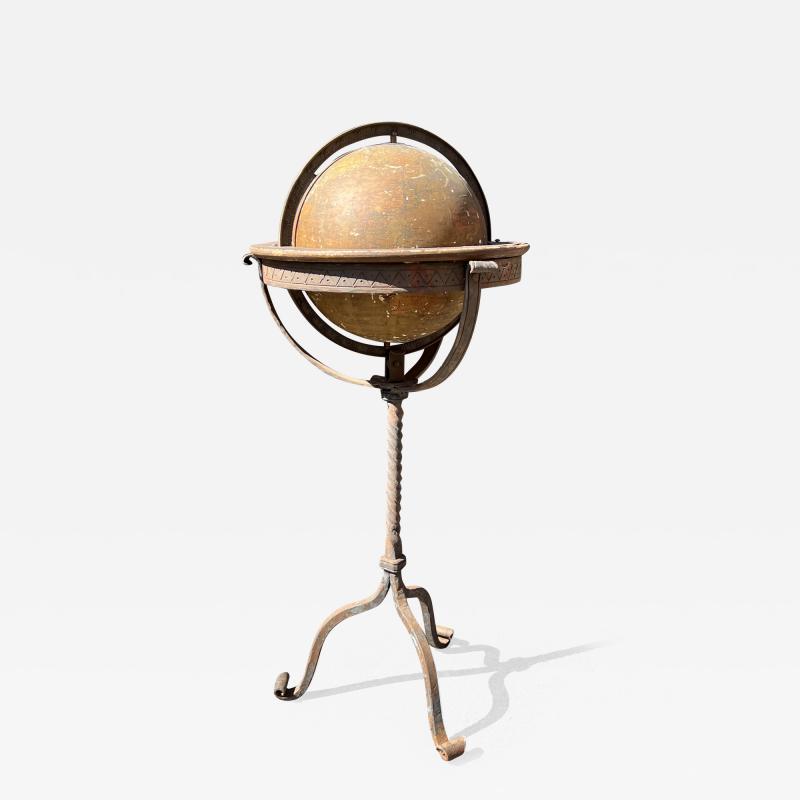 ANTIQUE GLOBE IN DECORATIVE IRON STAND WITH TRIPOD BASE