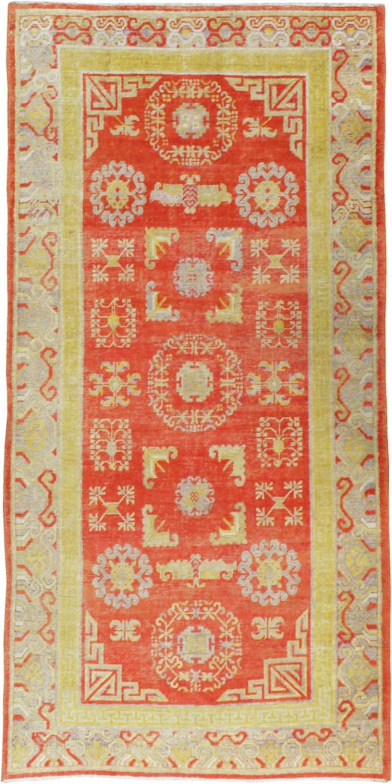 ANTIQUE KHOTAN RUG