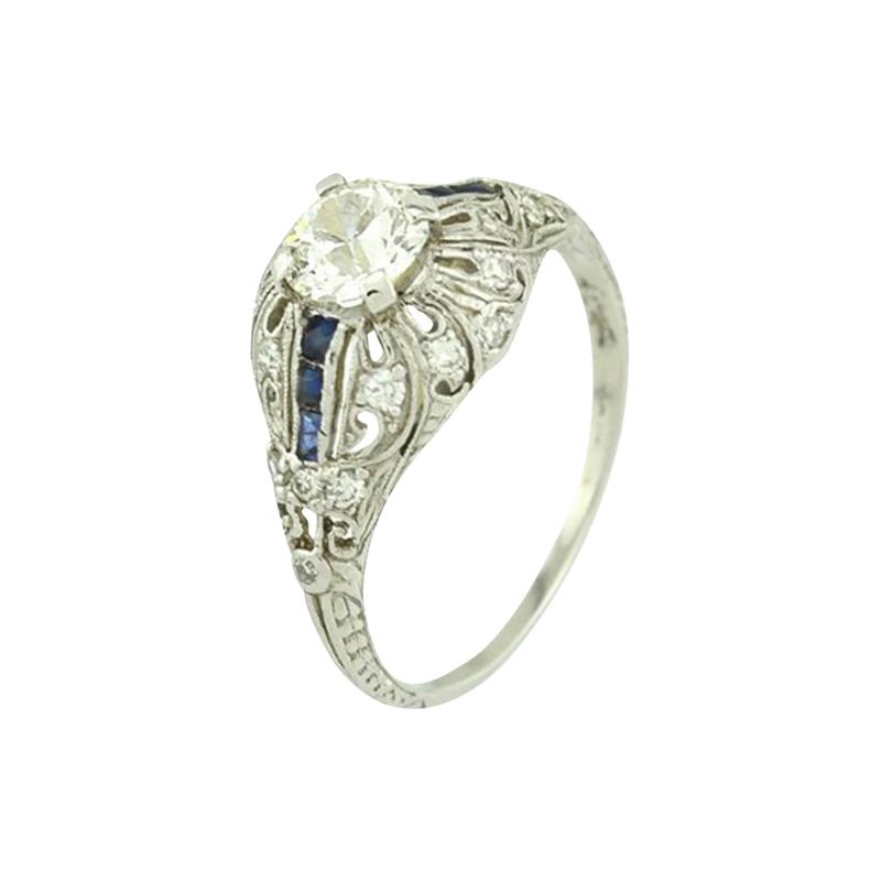 ART DECO 0 66 CARAT OLD CUT DIAMOND AND SAPPHIRE PLATINUM ENGAGEMENT RING