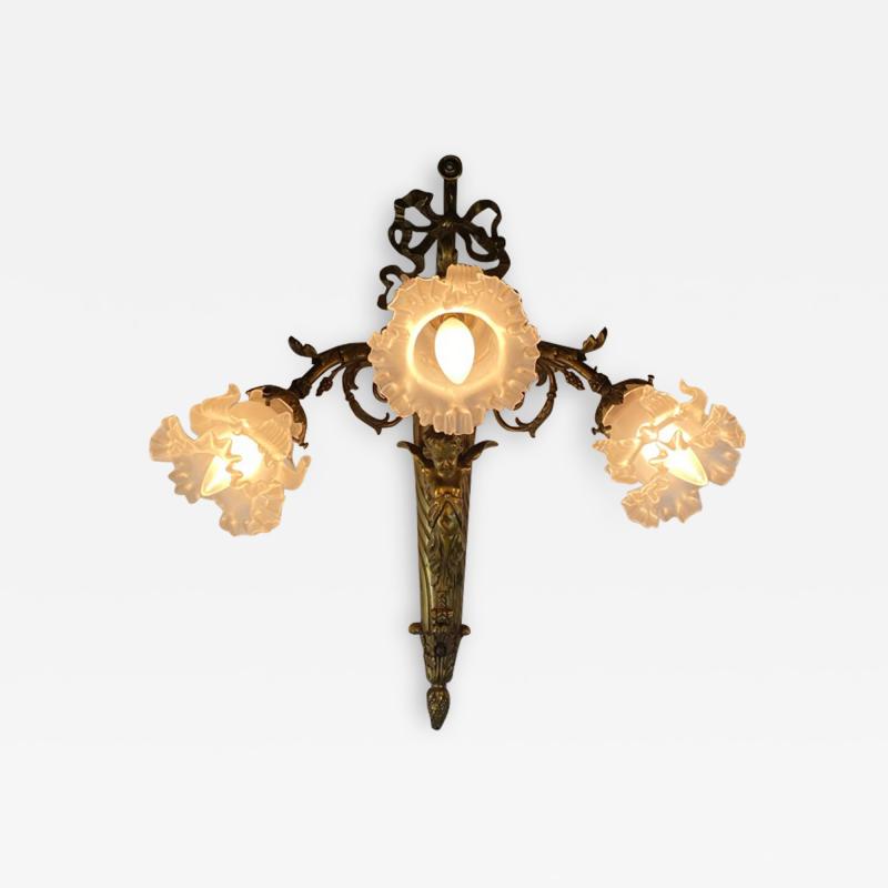 ART NOUVEAU FRENCH BRONZE CUPID SCONCE WITH THREE FANCY GLASS FLOWER SHADES