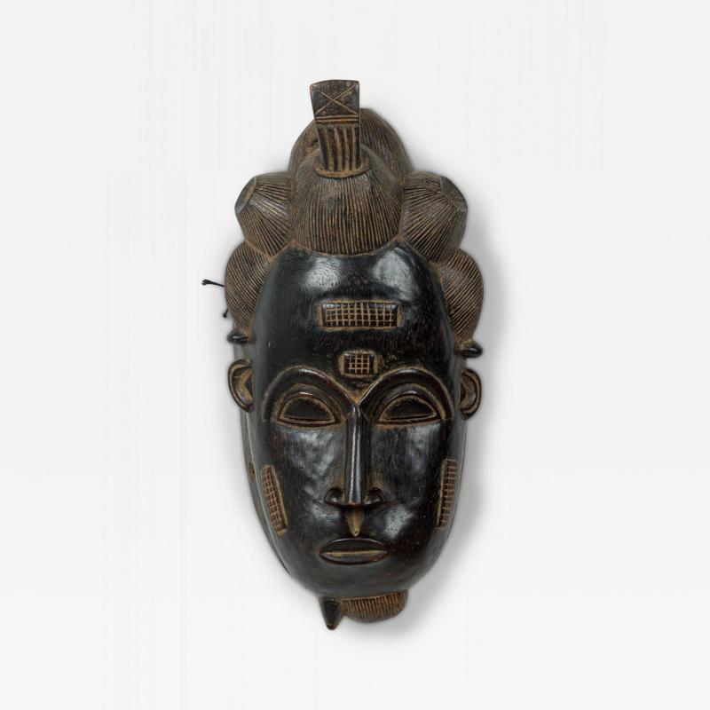 African Ivory Coast 20th Century Carved Wood Baule Male Face Mask