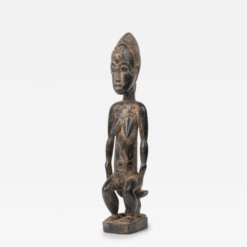 African Ivory Coast 20th Century Carved Wood Baule Seated Female Spirit Spouse 
