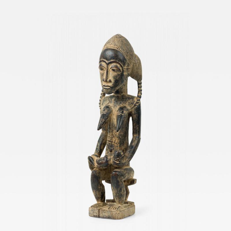 African Ivory Coast 20th Century Carved Wood Baule Seated Female Spirit Spouse 