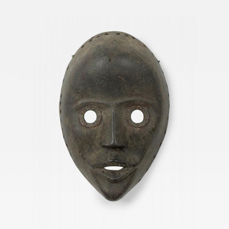 African Ivory Coast 20th Century Carved Wood Dan Face Mask Wall Plaque