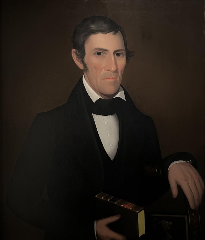 Ammi Phillips Portrait of A Gentleman holding a book of Wesley s sermons