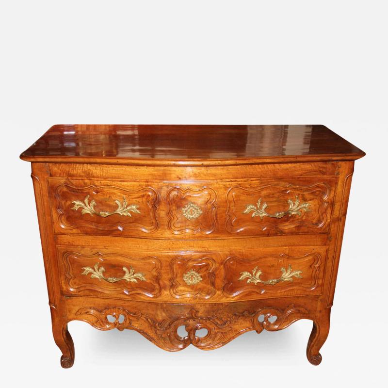 An 18th Century French Louis XV Walnut Two Drawer Commode