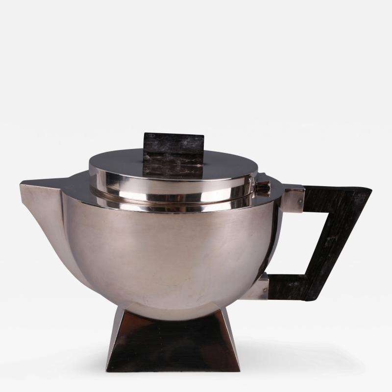 An Art Deco Silver Nickel and Ebony Teapot French ca 1920