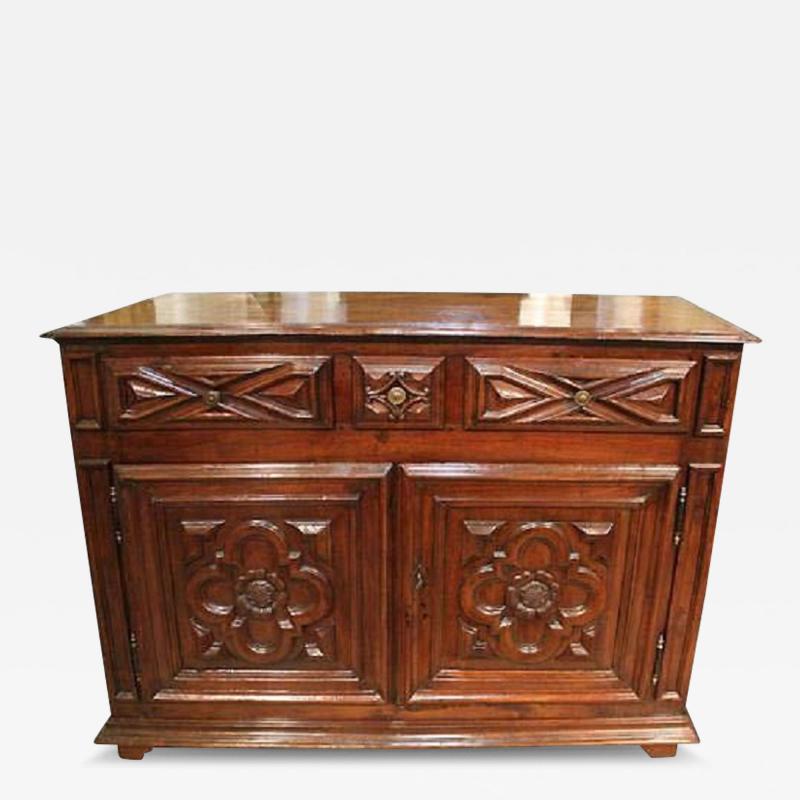 An Early 18th Century Baroque Florentine Geometric Carved Walnut Credenza