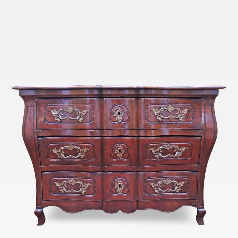 An Elegant 18th Century French Louis XV Walnut Commode