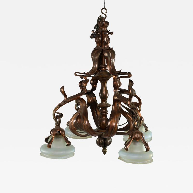 An Impressive Arts Crafts Copper Chandelier with Original Vaseline Shades