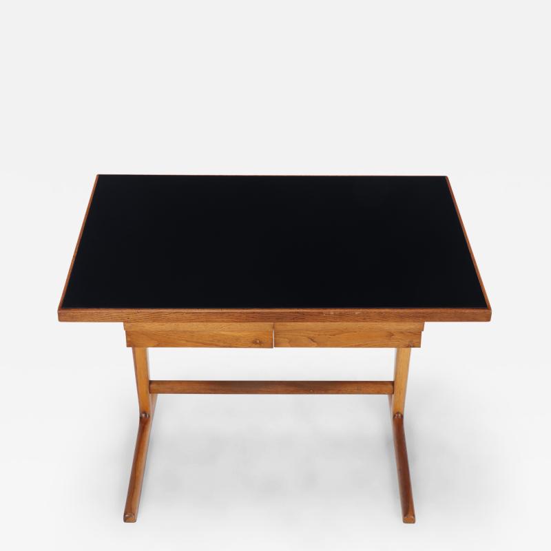 An Italian Architects oak table desk made with a slant circa 1960 