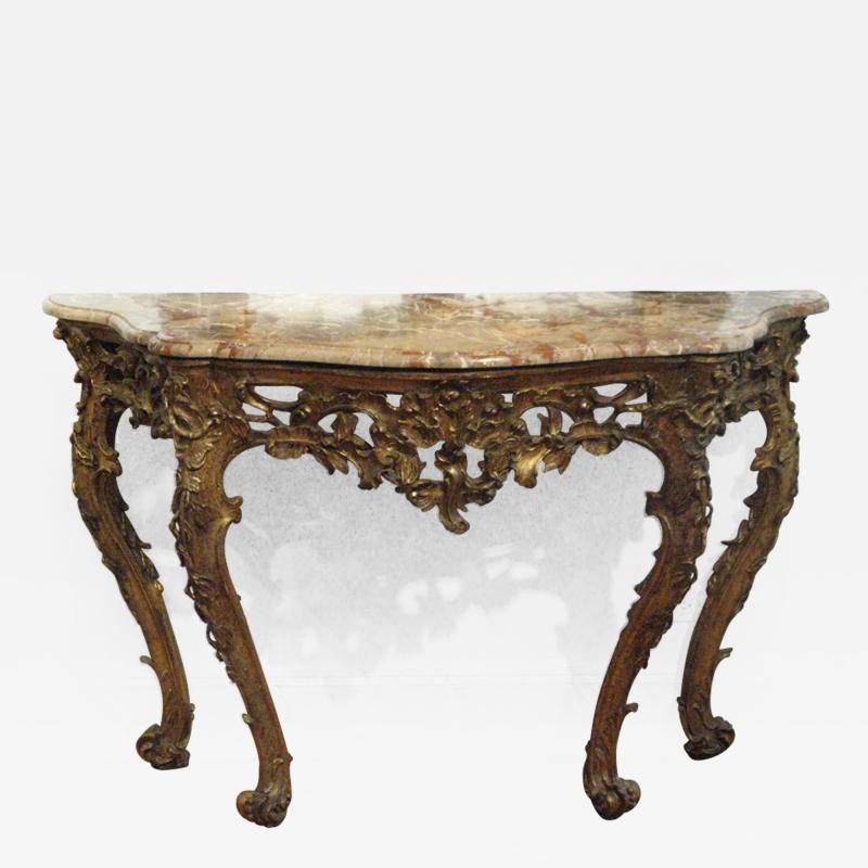 An Italian Carved and Gilded Console with Marble Top