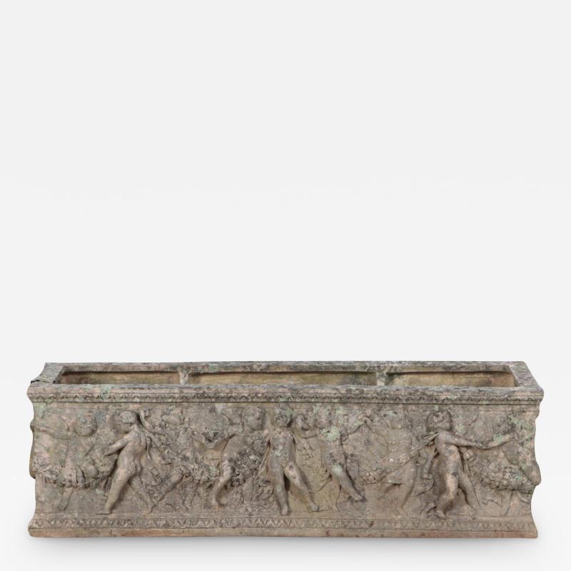 An Italian Terracotta rectangular planter with cherubs at play C 1930 