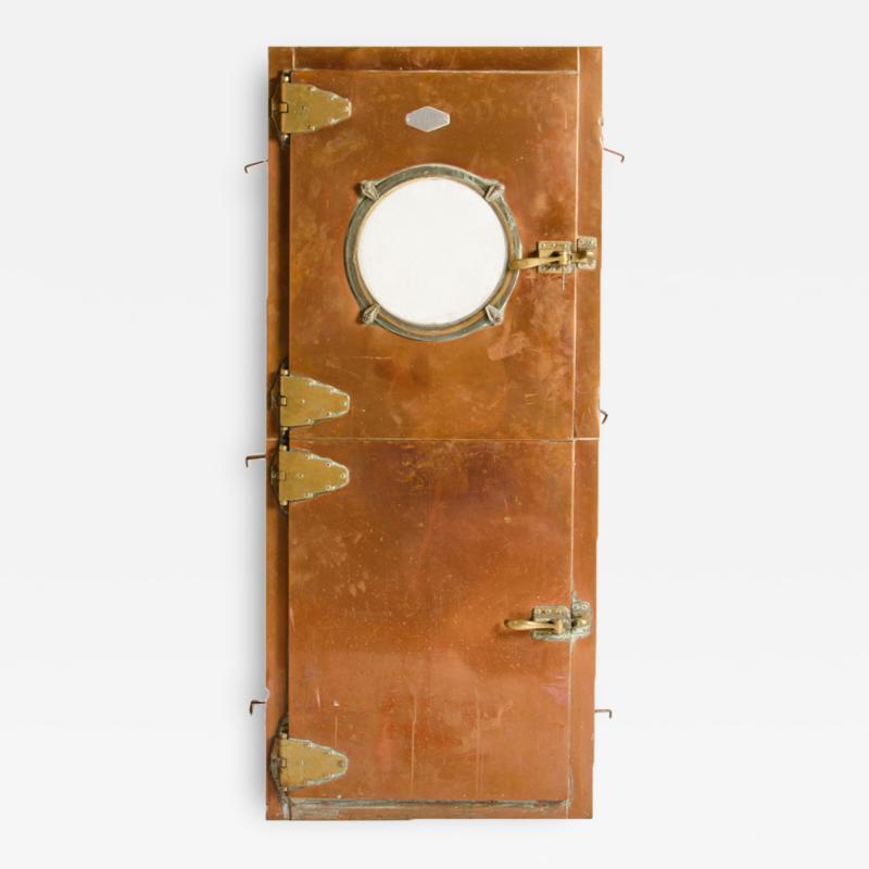 An Italian copper Dutch door circa 1930 with brass hinges Two doors