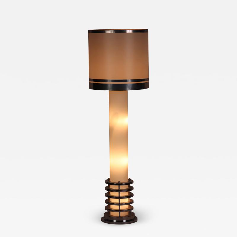 An Italian mid century modern floor lamp in polished chrome and opaline glass