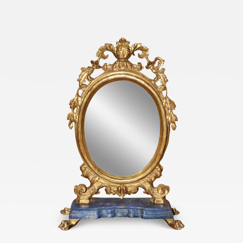 An Ovoid 18th Century Polychrome and Parcel Gilt Luccan Vanity Mirror 