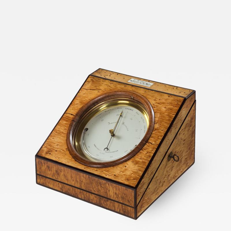 An aneroid desk barometer by C W Dixey