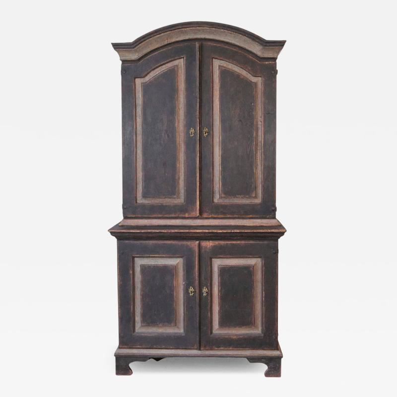 An antique Swedish two piece cupboard in black and grey