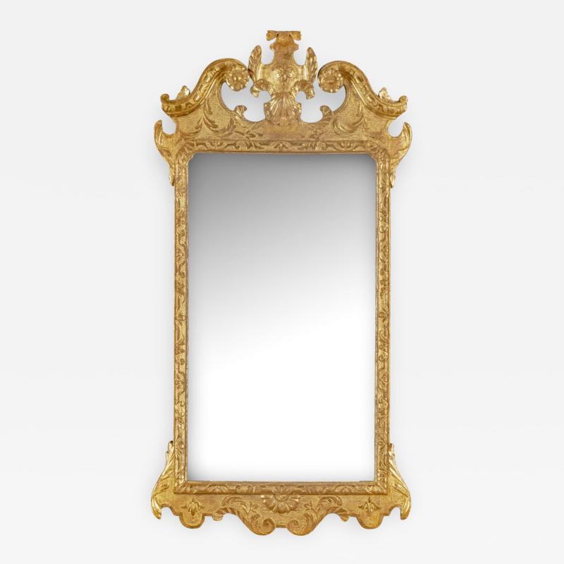 An attractive late George I giltwood mirror