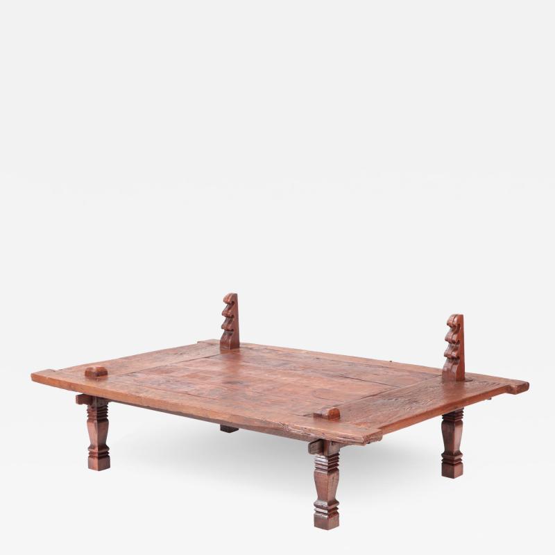 An early 19th century Indonesian Coffee Table Sewing Table solid teak