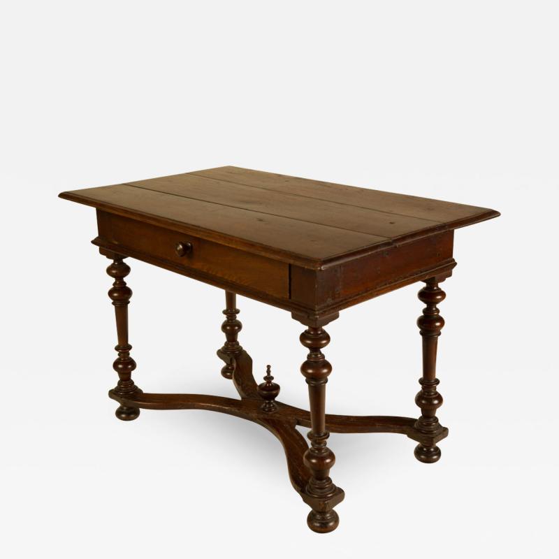 An early Italian turned legs walnut table one drawer circa 1850