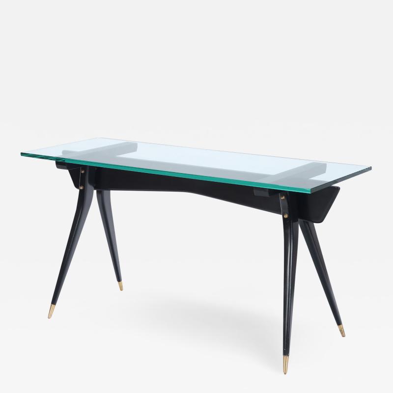An ebonized wood glass top console table circa 1950 