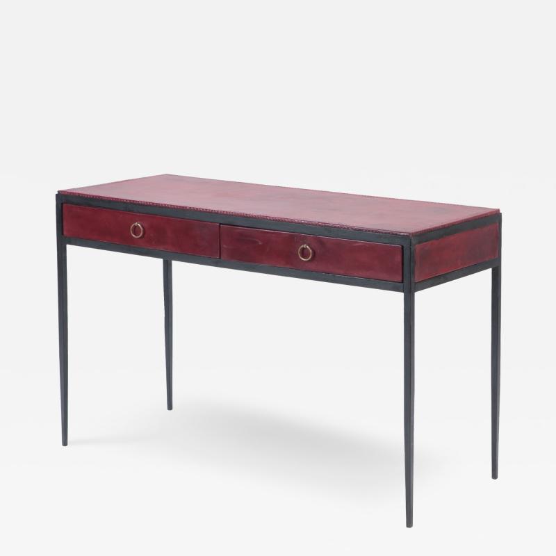 An iron and burgundy leather writing desk Contemporary
